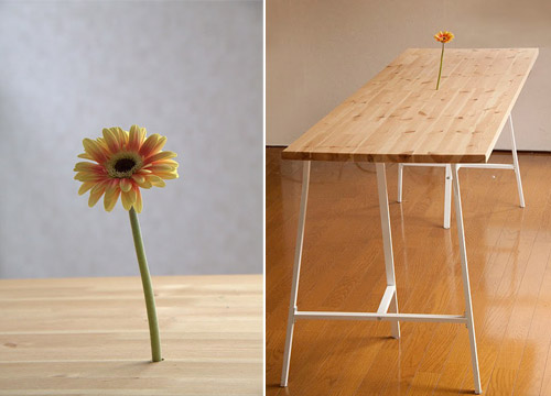 Flower Vase in the table as if flower comes out from the pine table.