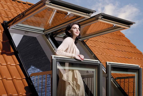 Innovative Window System Adds Small Balcony to Attic Room