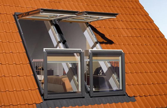 Innovative Window System Adds Small Balcony to Attic Room