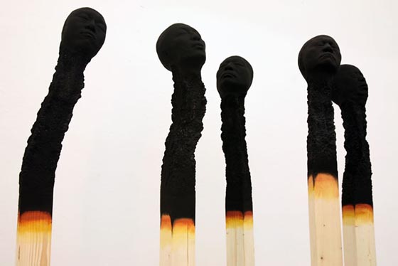 Matchstickmen: Unusual Giant Burnt Matches With Creepy Human Heads
