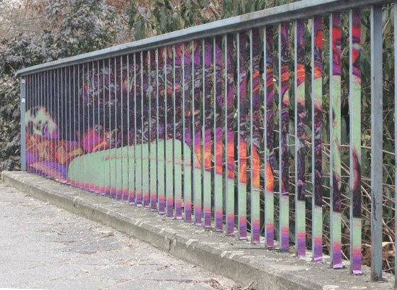 Hidden Street Art on Railings: Only Seen in Perfect Angle