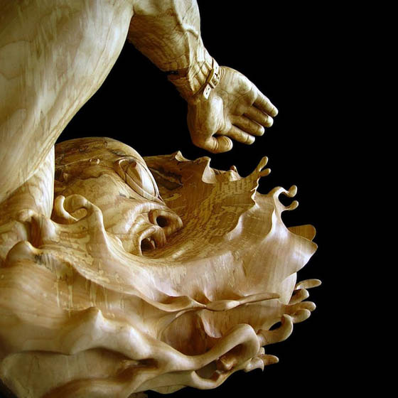 The Swimmer: Stunning Wood Sculpture Carved From a Single Piece of Basswood