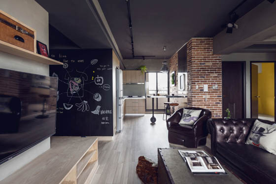 Industrial Style Apartment with Cement Finishes on Walls