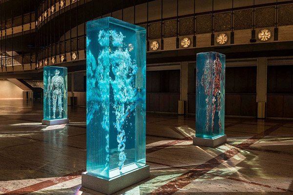Fantastic 3D Human Collage Encased within Layers of Glass