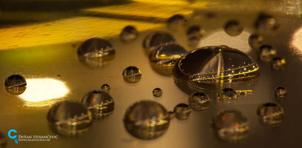 City in Water Droplet by Dusan Stojancevic