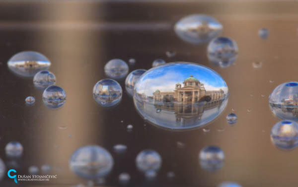 City in Water Droplet by Dusan Stojancevic