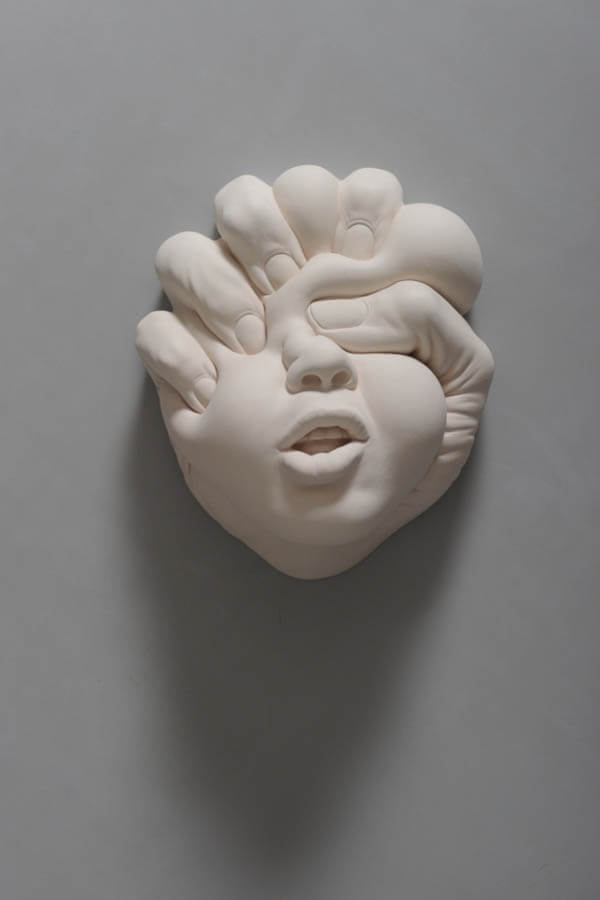 Lucid Dreams: Stunning Porcelain Sculptures of Morphing Human Faces