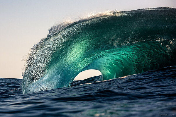 Stunning Photos of Dazzling Curvature of Waves Right as They Break