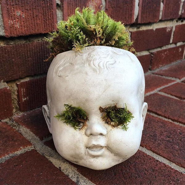 20 Creepy Planter Made Out of Old Dolls