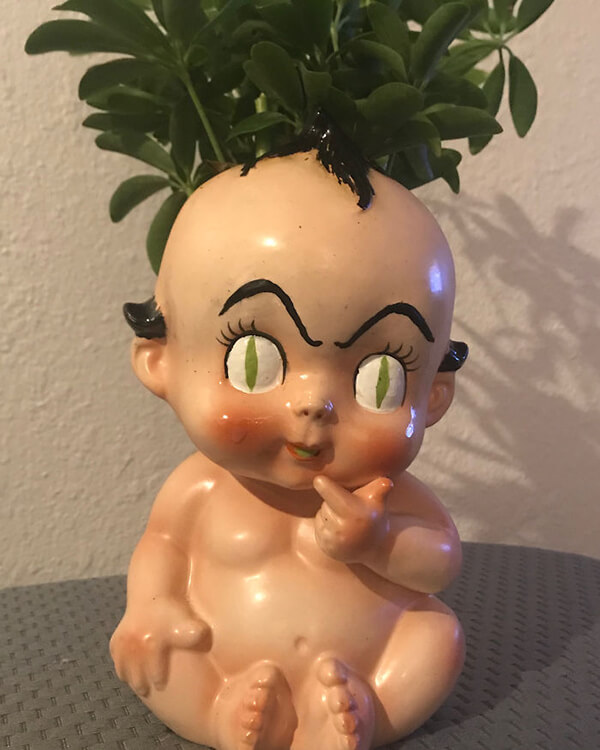 20 Creepy Planter Made Out of Old Dolls