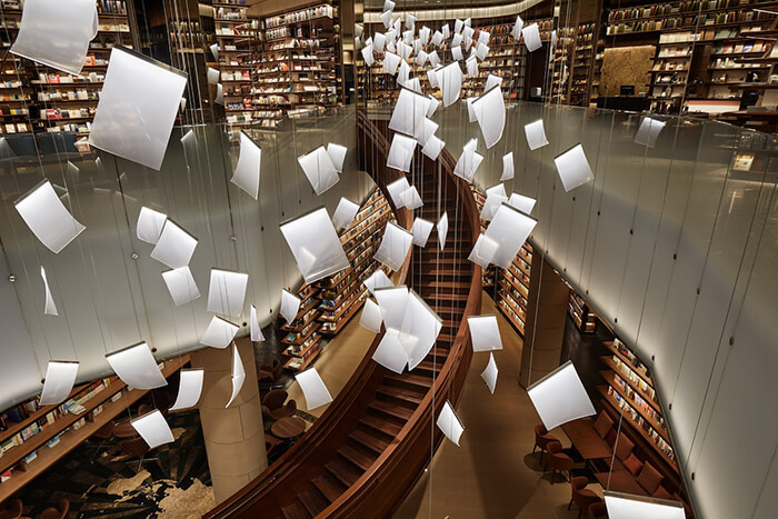 Incredible Chinese Bookstore with Chandeliers Look Like Sheets of Paper Floating in Mid-Air