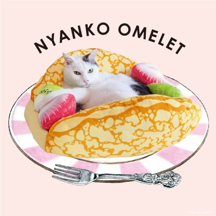 Your Cat Can Sleep Anywhere and Now They can Sleep on Crepe Omelet as Well