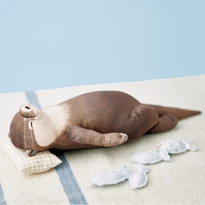 Sleeping Otter Pouch: Probably The Cutest Arm Rest You Might Have